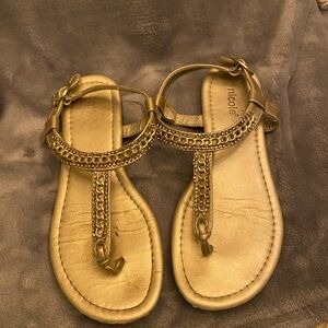 Nicole Gold Sandals with T-Strap and Rhinestones